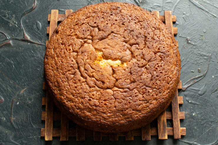 Cooling The Sponge Cake Baked nut sponge cake cooling on a wire rack