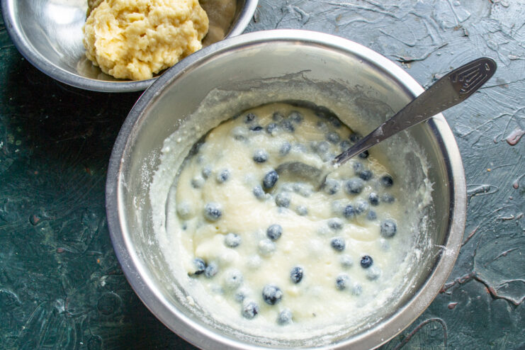 Folding blueberries into the cream Gently mixed ricotta cream with whole blueberries