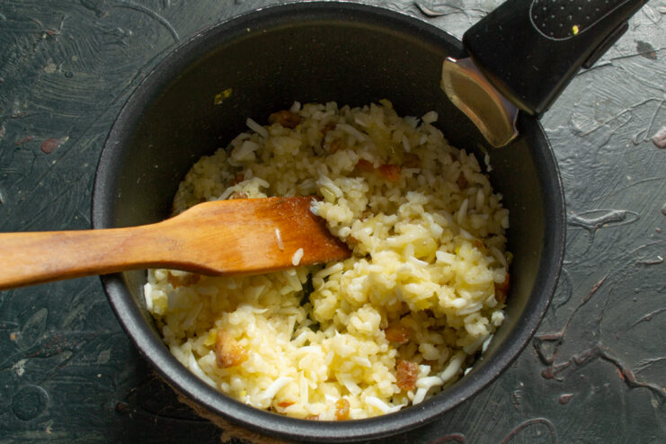 Completed Crepe Filling Mixing the finished rice, egg, and chicken crackling filling