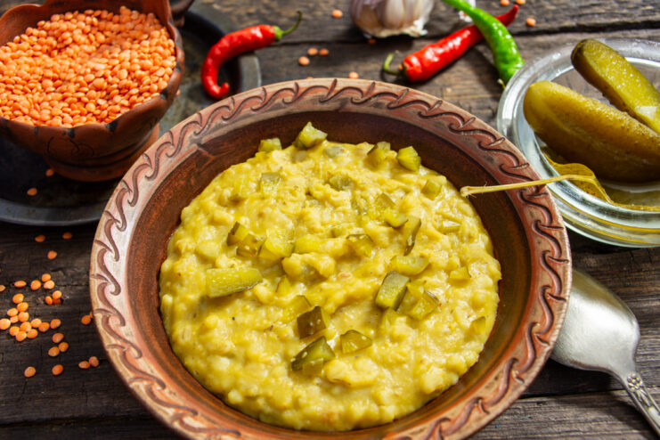 Savory pearl barley and red lentil porridge with fermented pickles