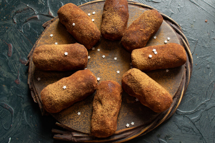 Nochka pastries dusted with cocoa and decorated with sugar stars.
