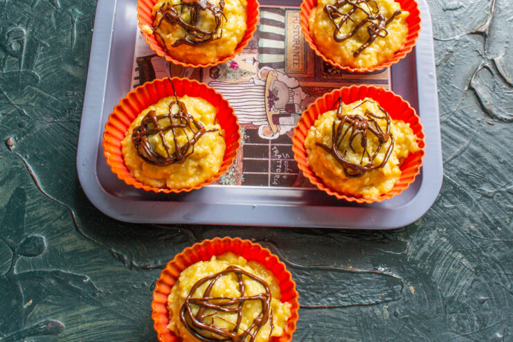 No-bake cakes in silicone molds drizzled with melted dark chocolate