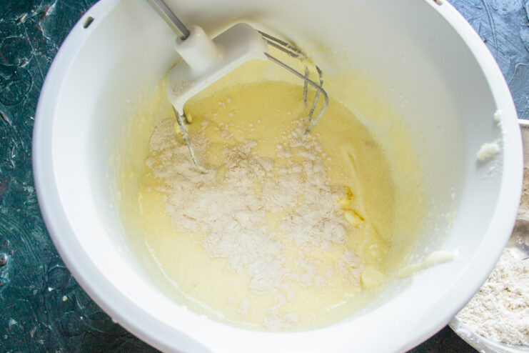 Mixing the batter Adding flour mixture into the wet batter base