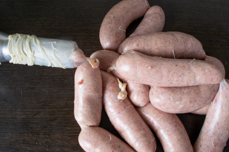 Shaping the sausages Process of filling the casing with ground meat