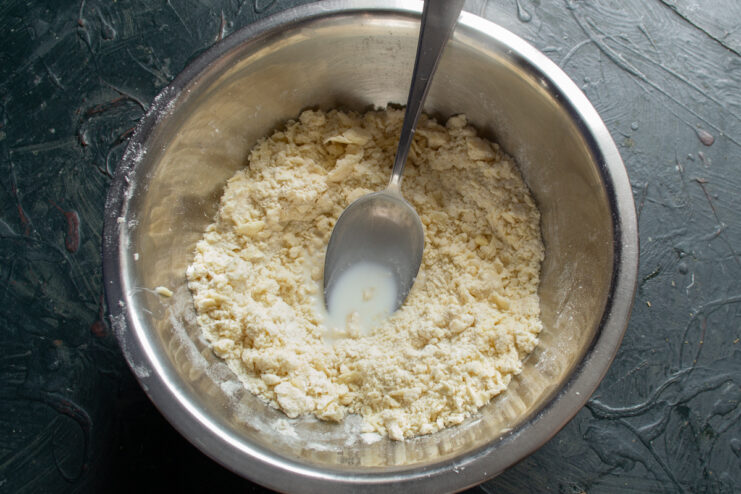 Shortcrust Dough Base Rubbing cold butter into flour to create coarse crumbs
