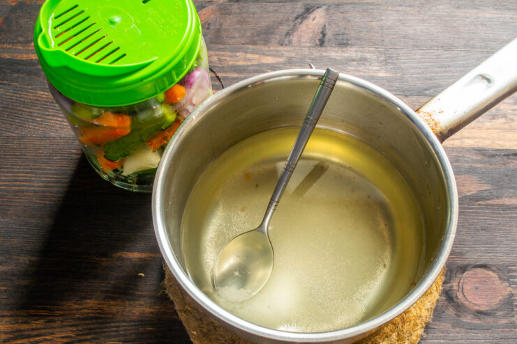 Clear marinade with sugar and salt in a metal saucepan