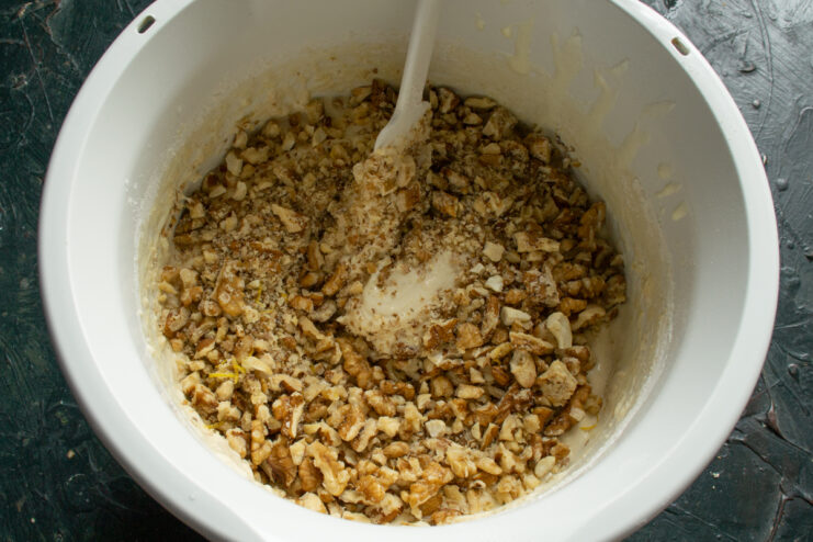 Adding the nuts Roughly chopped nuts mixed into the biscotti dough