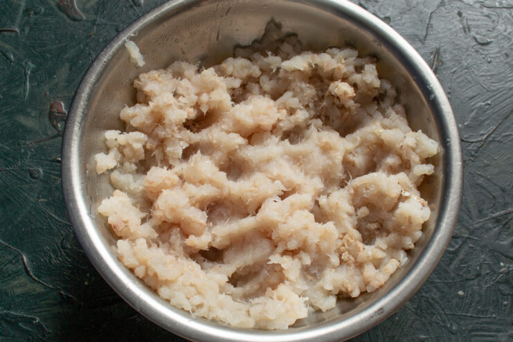 The Fish Base Raw minced white fish prepared in a bowl