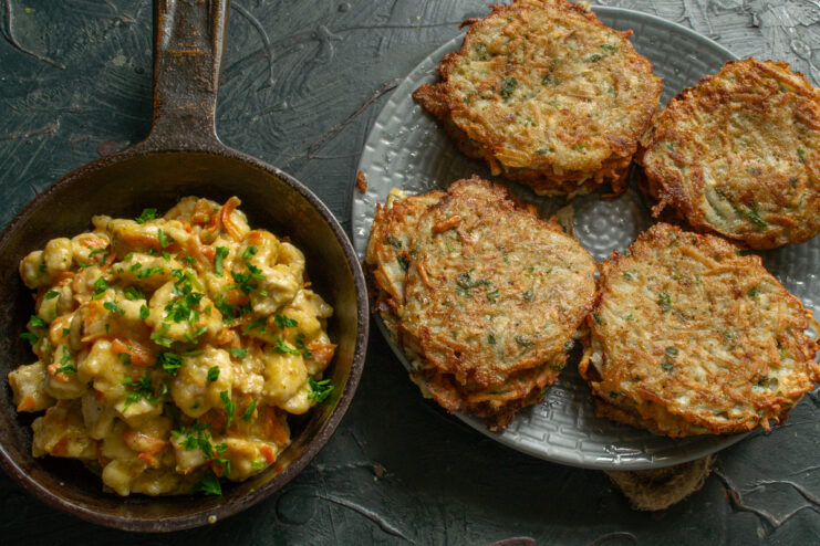 Serving the dish Plated Jerusalem artichoke fritters with a rich chicken ragout