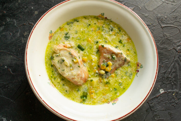 Serving the Soup Hot ocean perch soup in a deep bowl sprinkled with black pepper