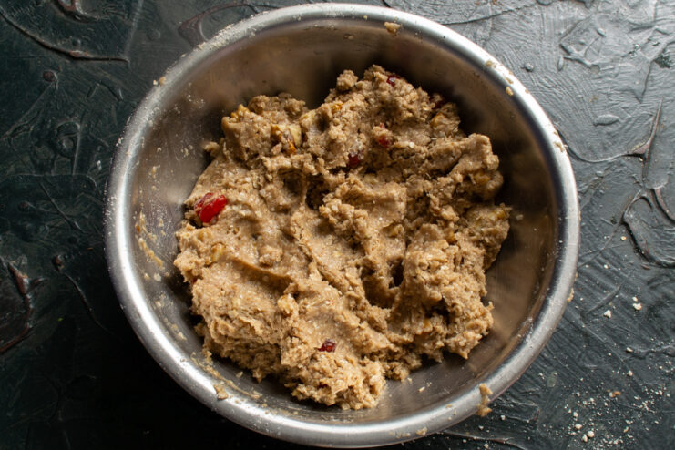 Kneading and chilling A round ball of prepared oatmeal cookie dough resting in a bowl