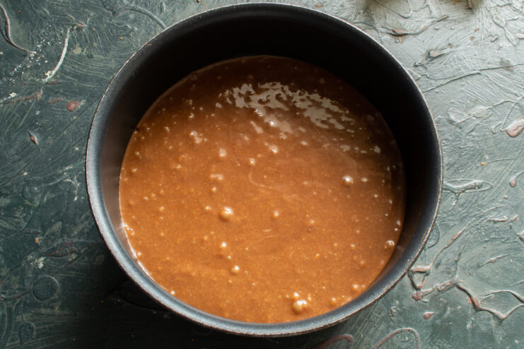 Ready for Baking Chocolate batter in a round baking pan