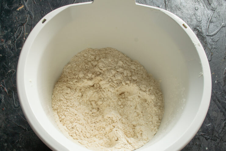 Mixing wheat flours Different types of flour being combined inside a stand mixer bowl