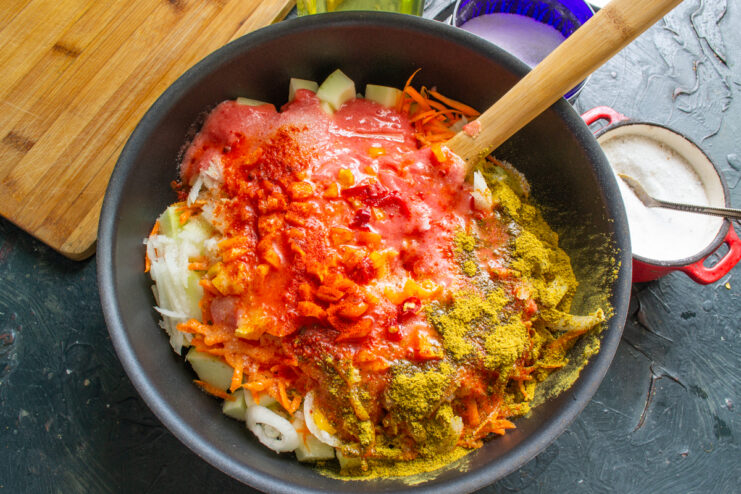 Spices, salt, and sugar added to the vegetable mixture