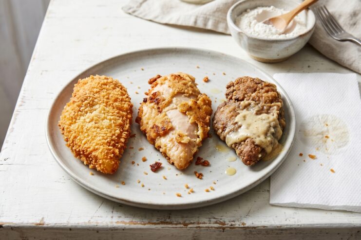 Visual Differences Between Batter and Breading Three pieces of fried chicken fillet side-by-side comparing different crust textures