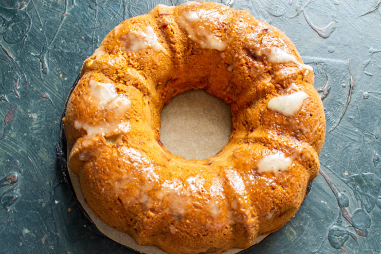 Glazing with honey Baked cake being covered in a shiny honey glaze