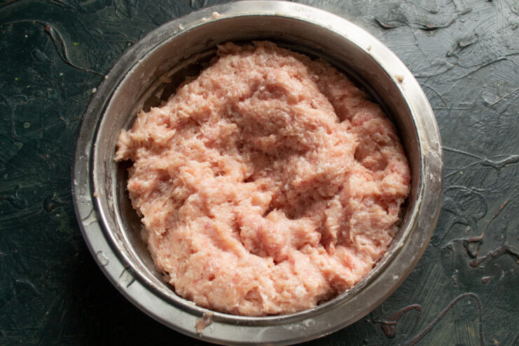 Mixing the minced meat Thoroughly mixed and smooth minced meat in a bowl