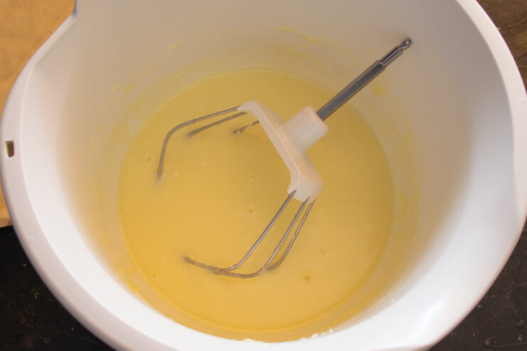 Finished cheesecake filling Smooth whipped farmer's cheese filling in a bowl