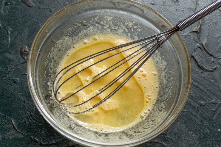 Whisking the Batter Base Whisked egg and sugar mixture ready for the next baking steps