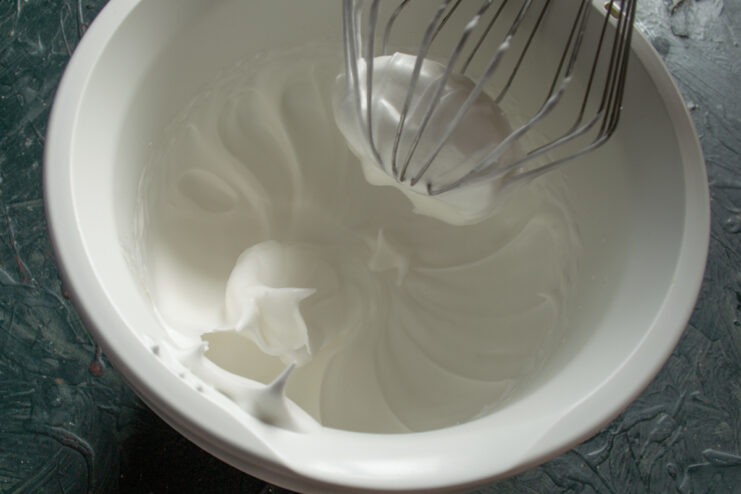 Perfect Meringue Cream Thick and glossy meringue cream on a whisk