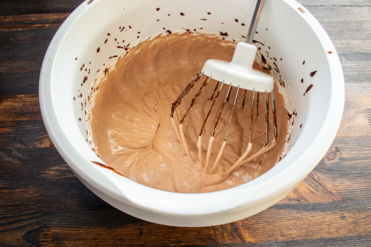 Ricotta Chocolate Cream Whipped ricotta and chocolate frosting in a mixing bowl
