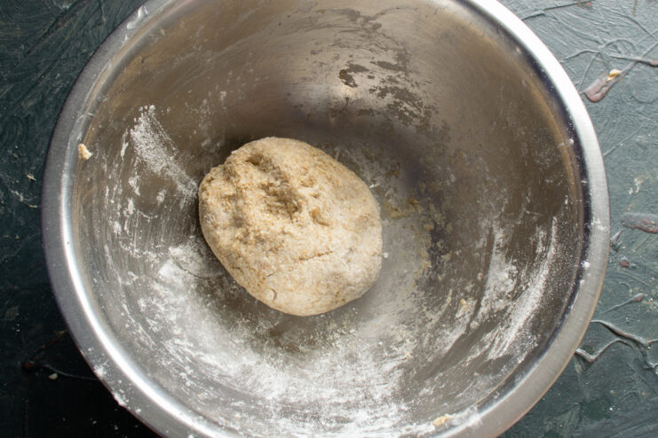Freshly kneaded rye dough Freshly kneaded sticky rye dough resting in a metal mixing bowl