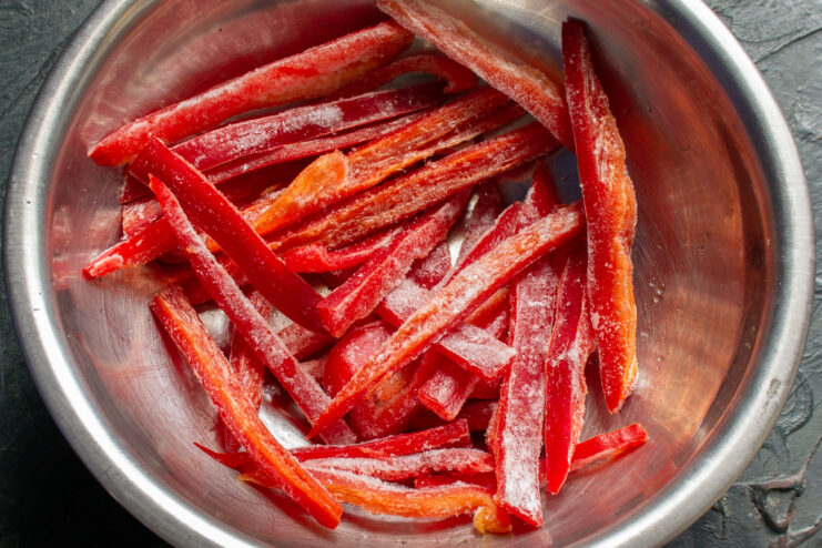 Preparing Frozen Peppers Frozen bell pepper strips in a bowl