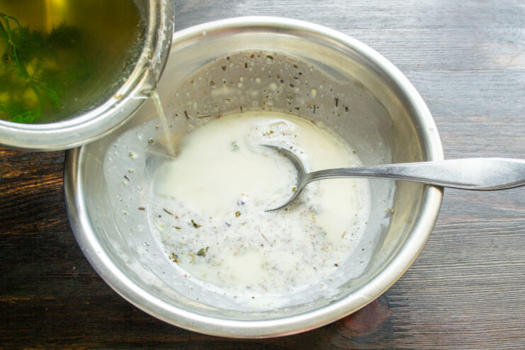 Pouring hot potato cooking water into the sauce base