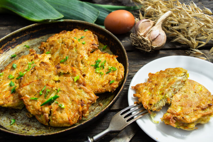 Leek and oat fritters served on a plate
