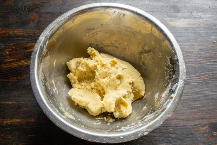 Two halves of kneaded dough wrapped and ready to be frozen