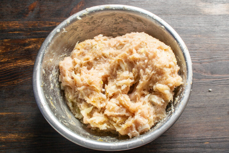 Smooth and well-mixed ground chicken filling in a bowl.