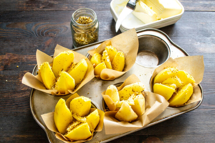 Sprinkling Georgian Svan salt over quartered potatoes