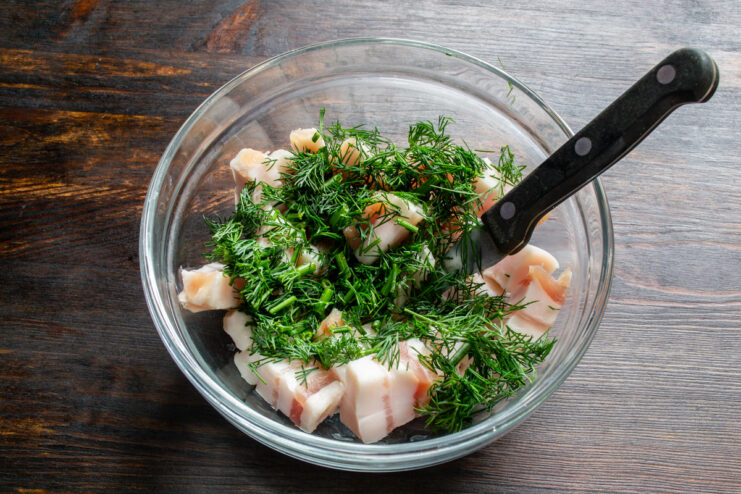 Diced cured pork fat mixed with freshly chopped dill