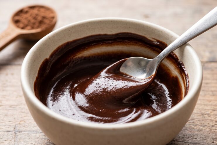 Smooth Chocolate Paste Thick glossy chocolate paste made from cocoa powder and water in a bowl