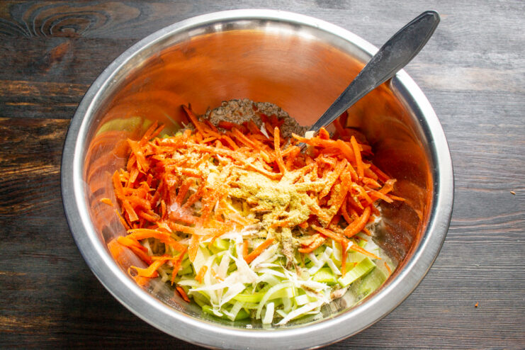 Spices and salt added to the vegetable bowl