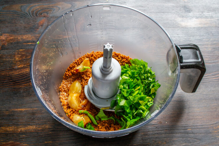 Adding fresh herbs Fresh chopped parsley and celery leaves mixed with ground peanuts